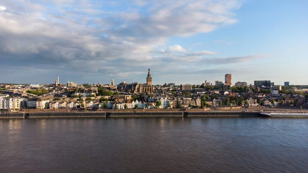 IT support Nijmegen: the Nijmegen skyline seen from across the Waal